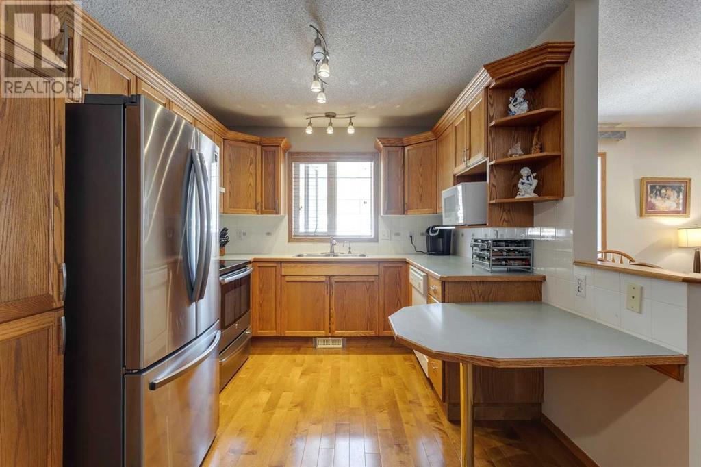 Single Family House Bungalow for Sale in  Harvest Lake Villas NE Harvest Hills Calgary 