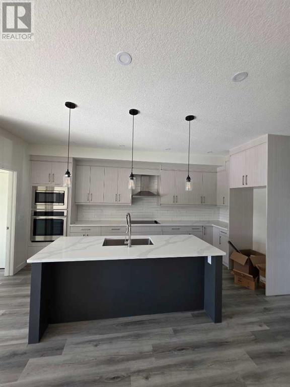 Single Family House for Sale in   Street SE Forest Lawn Calgary 