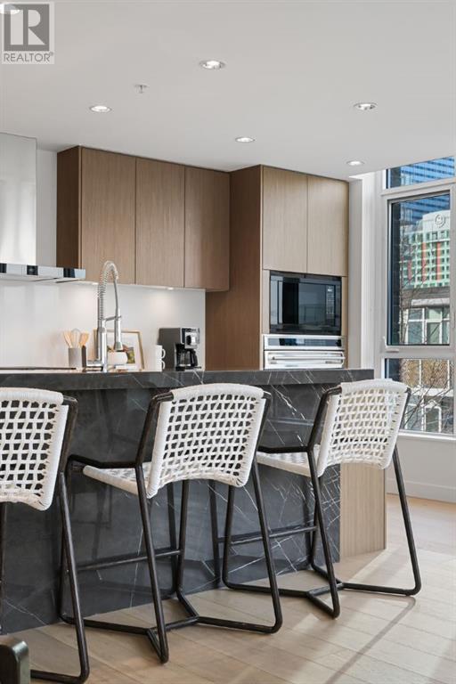 Single Family House for Sale in   Waterfront Mews SW Chinatown Calgary 