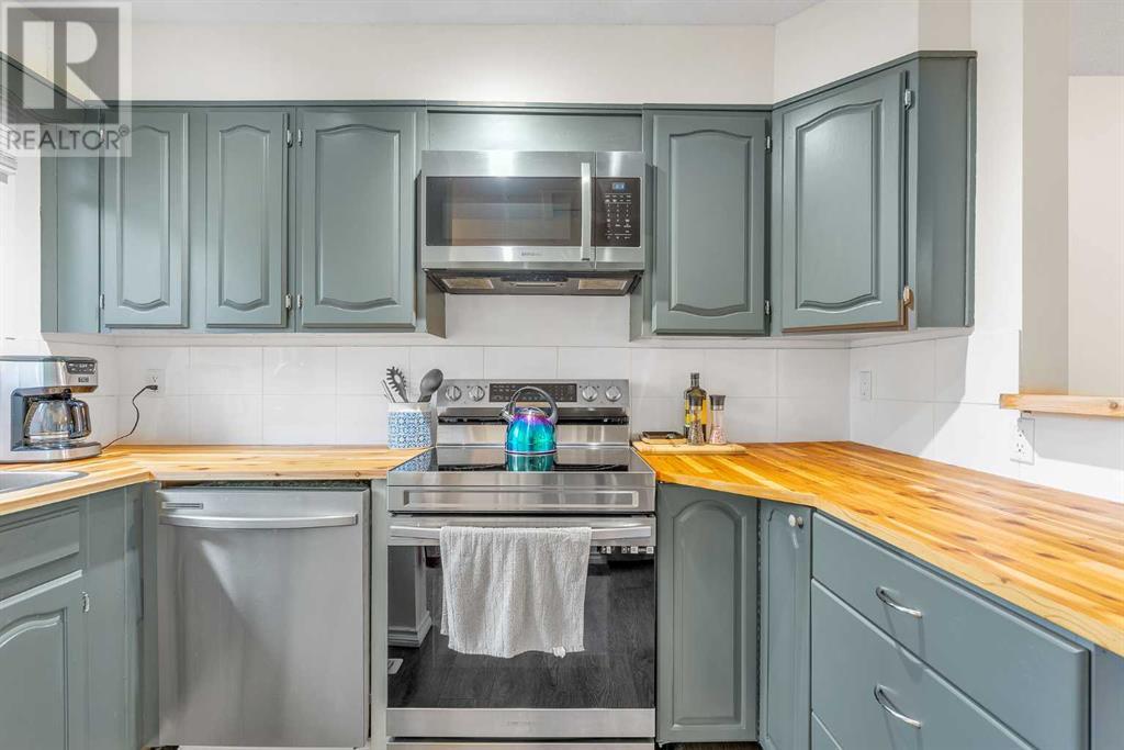 Single Family House Bi-level for Sale in  Storybook Terrace NW Ranchlands Calgary 
