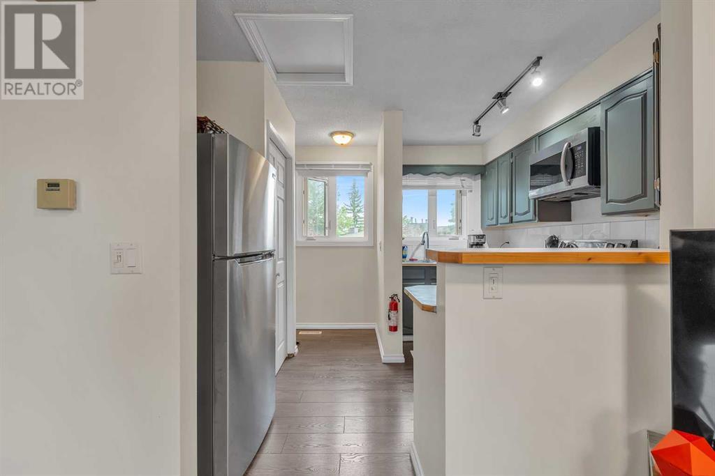 Single Family House Bi-level for Sale in  Storybook Terrace NW Ranchlands Calgary 