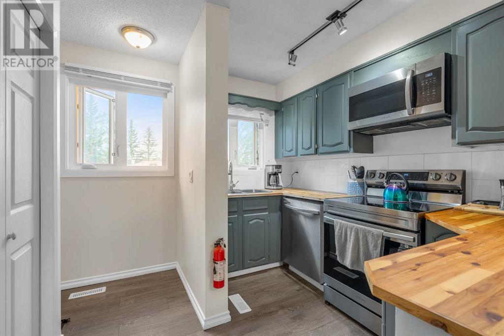 Single Family House Bi-level for Sale in  Storybook Terrace NW Ranchlands Calgary 