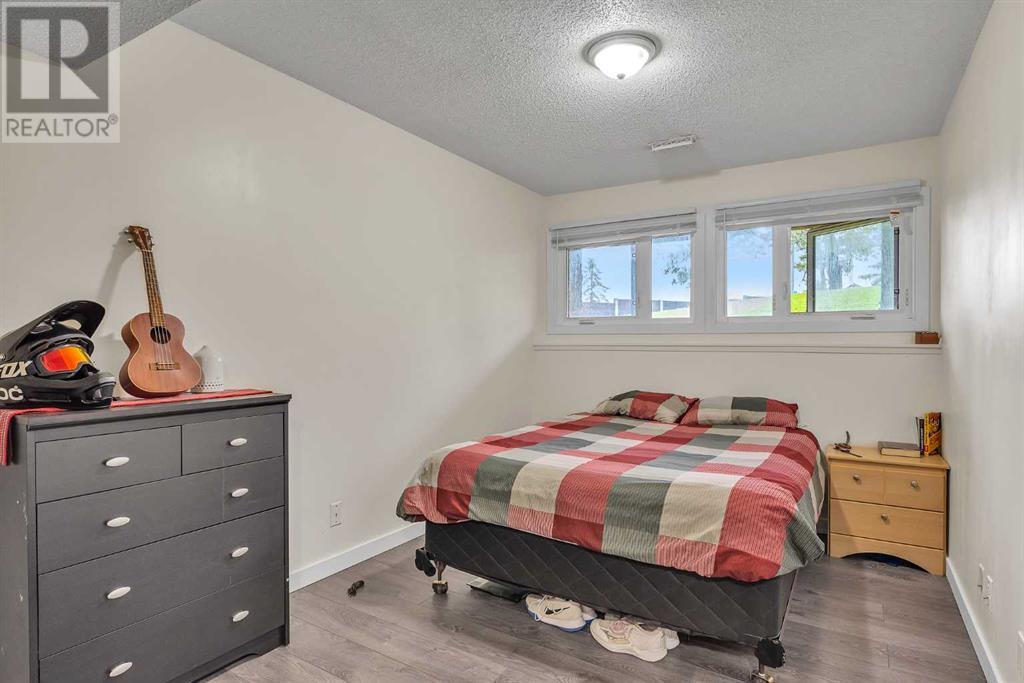 Single Family House Bi-level for Sale in  Storybook Terrace NW Ranchlands Calgary 
