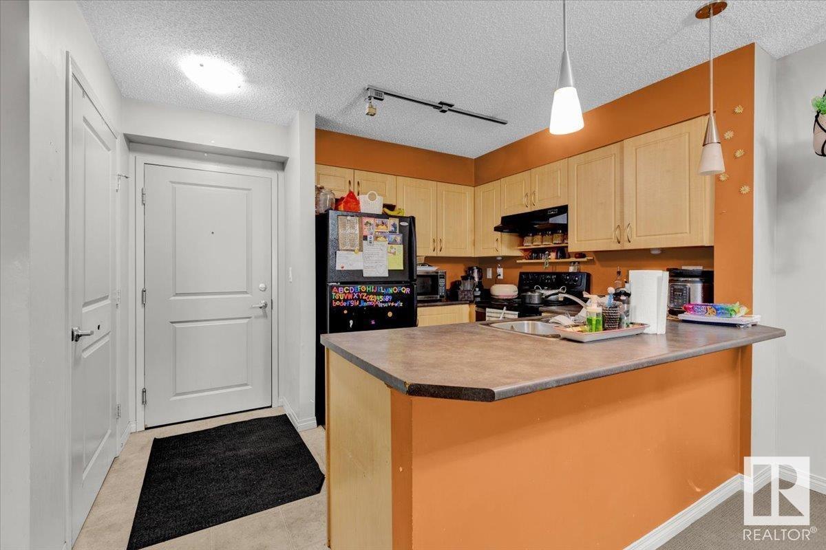 Photo 11 of 114 11453 Ellerslie Rd Sw, Edmonton AB