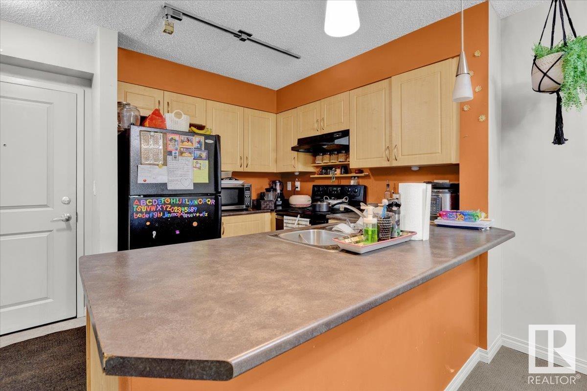 Photo 12 of 114 11453 Ellerslie Rd Sw, Edmonton AB