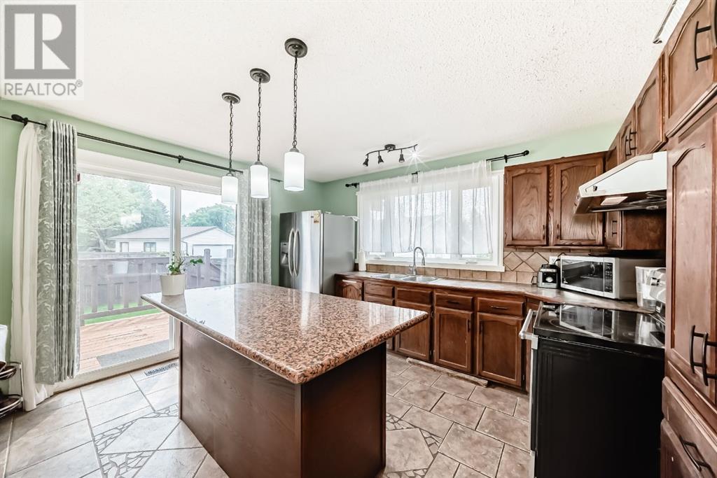Single Family House Bungalow for Sale in  Pinegreen Close NE Pineridge Calgary 