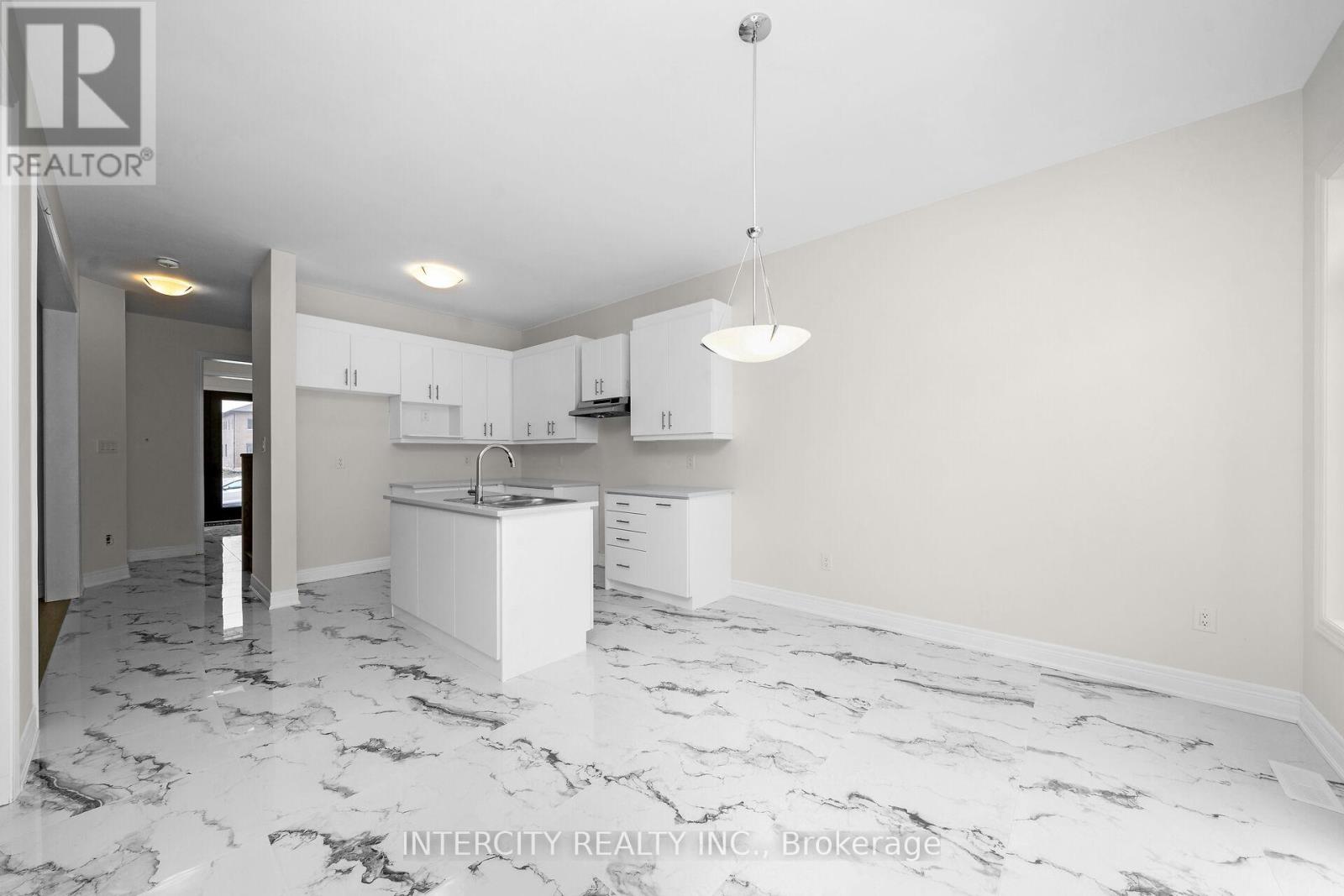 Photo 9 of 60 Claremont Drive, Brampton ON