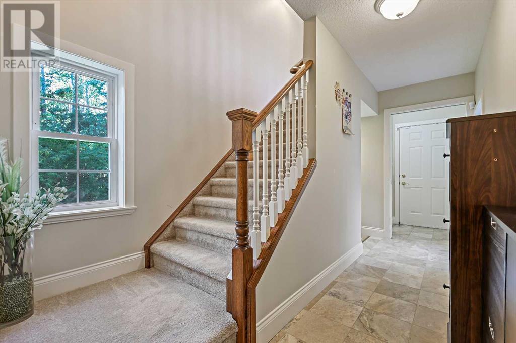 Single Family House for Sale in  Slopeview Drive SW Springbank Hill Calgary 