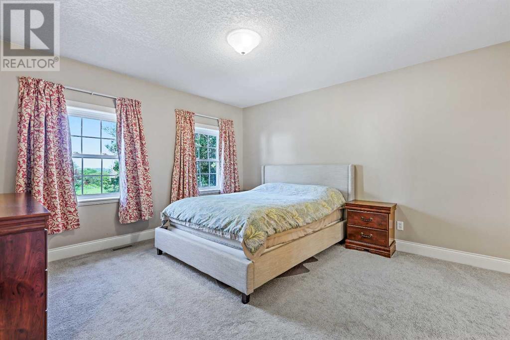 Single Family House for Sale in  Slopeview Drive SW Springbank Hill Calgary 