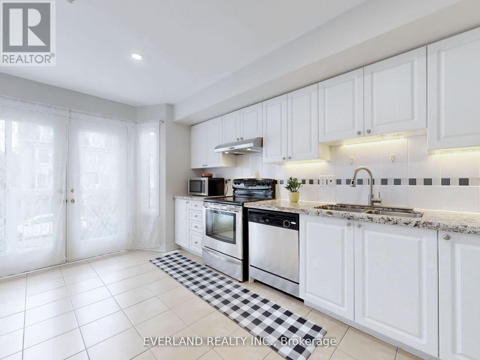 Photo 5 of C 1465 Birchmount Road, Toronto ON