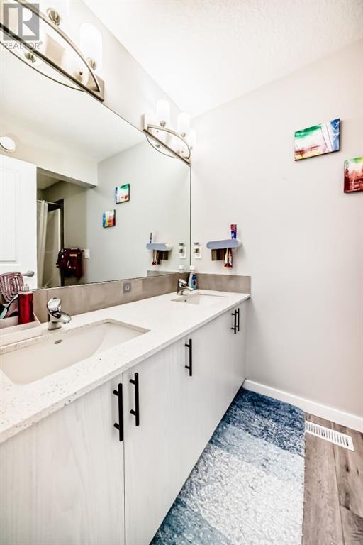 Single Family House for Sale in  Lucas Terrace NW Livingston Calgary 