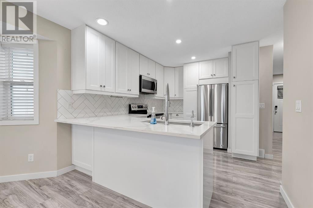 Single Family House for Sale in  Erin Meadow Close SE Erin Woods Calgary 