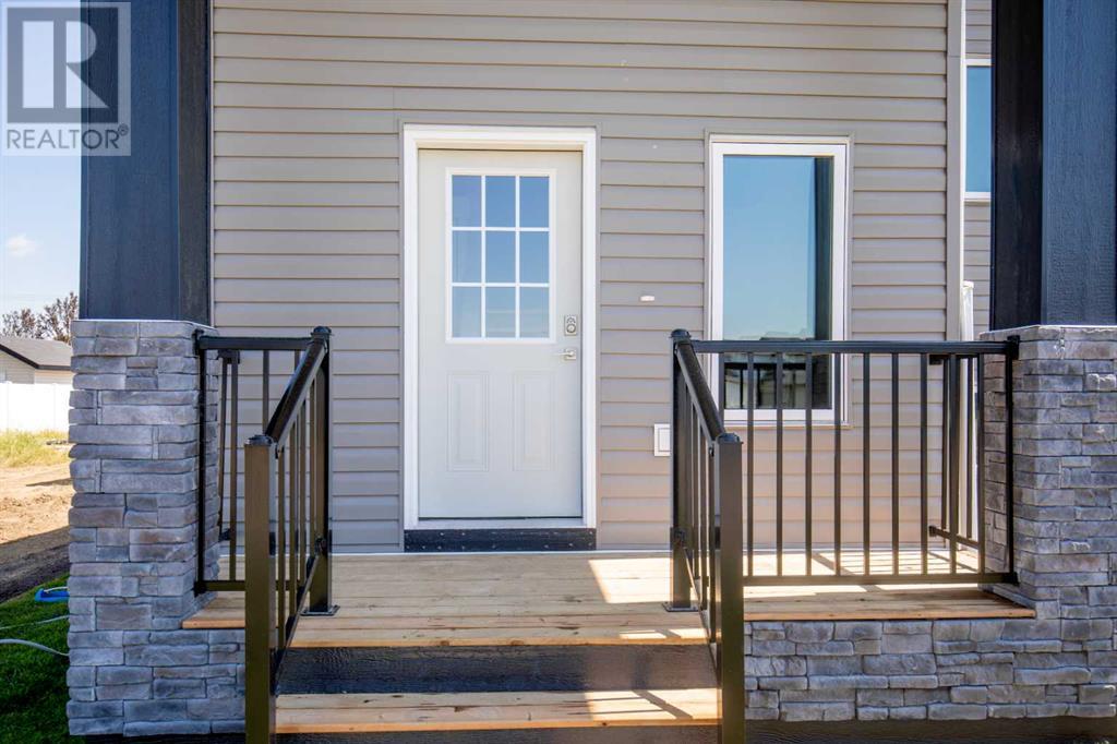 Photo 3 of 109 Aztec Crescent, Blackfalds AB