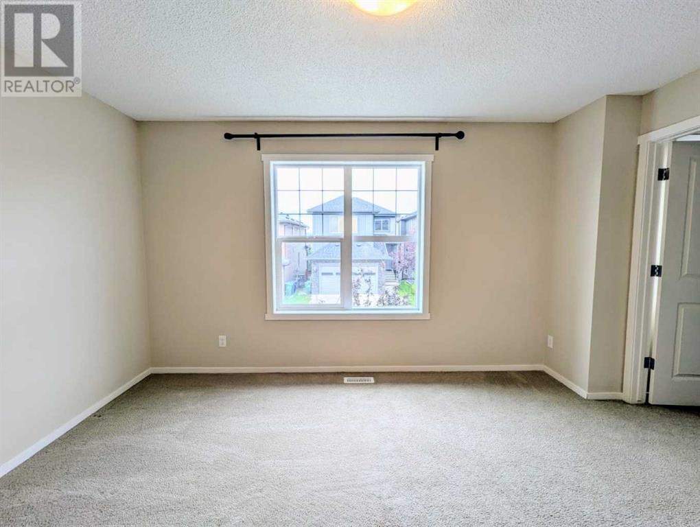 Photo 11 of 187 Evansborough Way Nw, Calgary AB