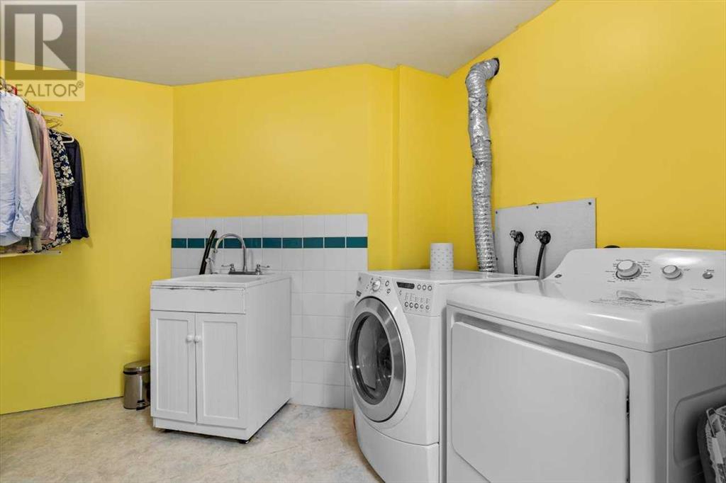 Single Family House for Sale in  Sundown Green SE Sundance Calgary 