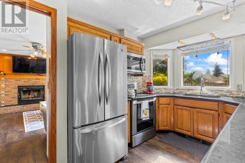 Single Family House for Sale in  Sundown Green SE Sundance Calgary 