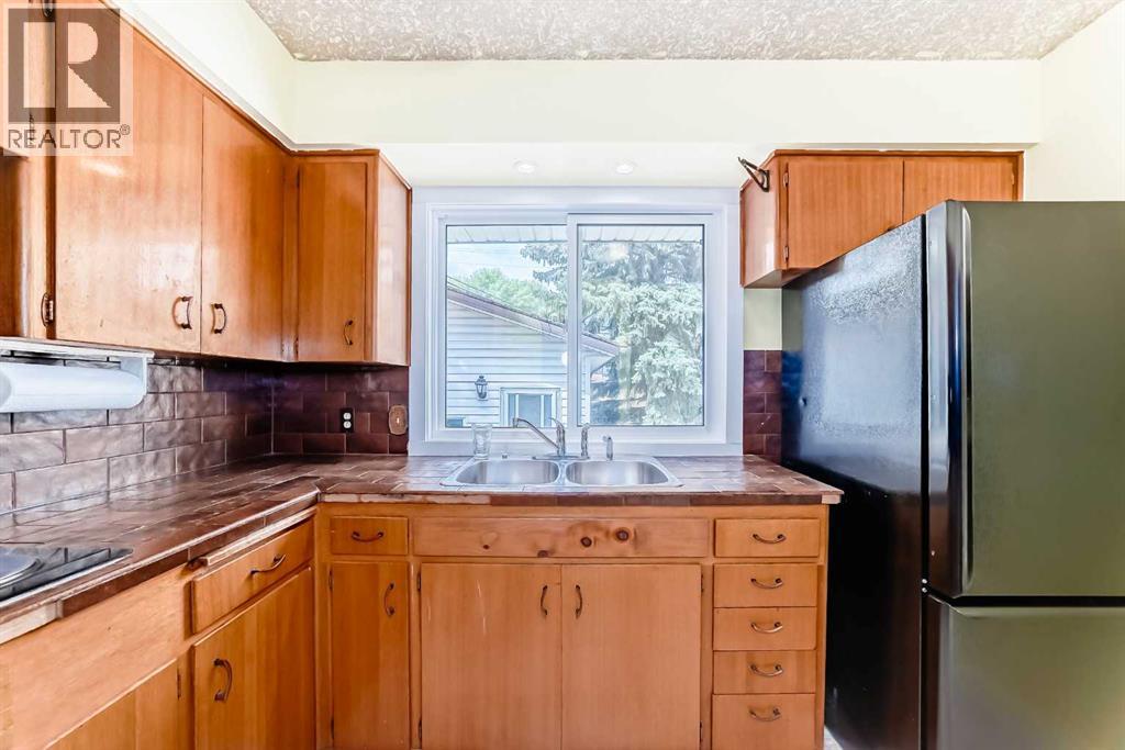 Single Family House Bungalow for Sale in  Fyffe Road SE Fairview Calgary 