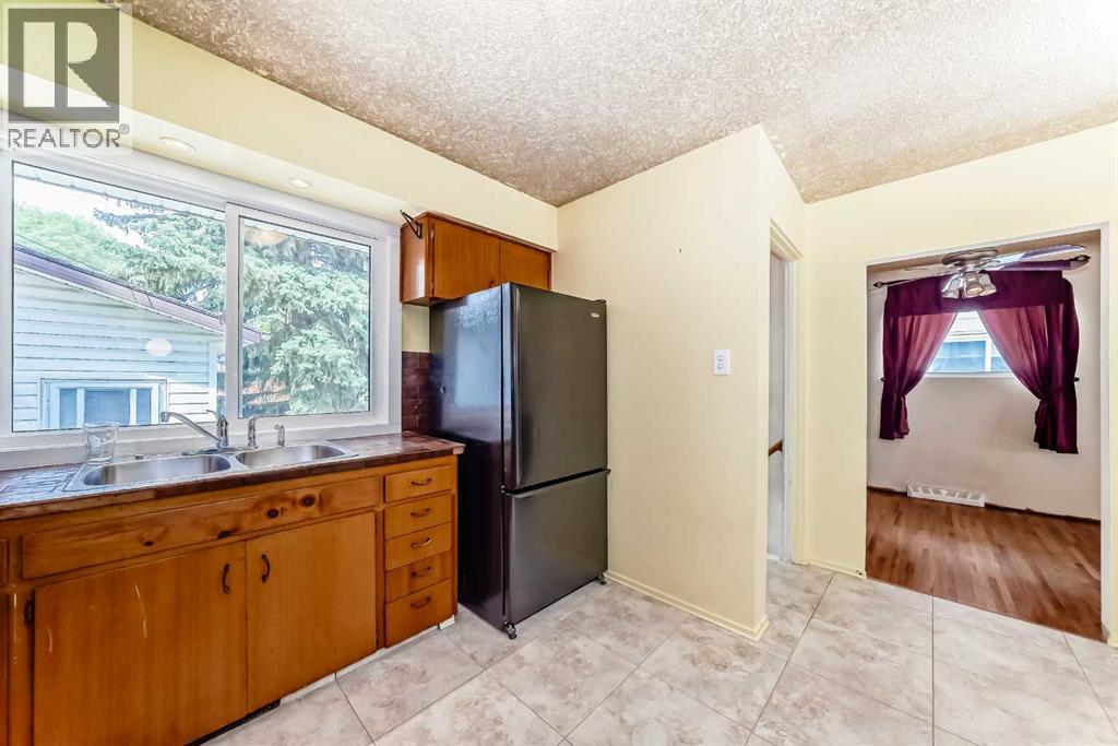 Single Family House Bungalow for Sale in  Fyffe Road SE Fairview Calgary 