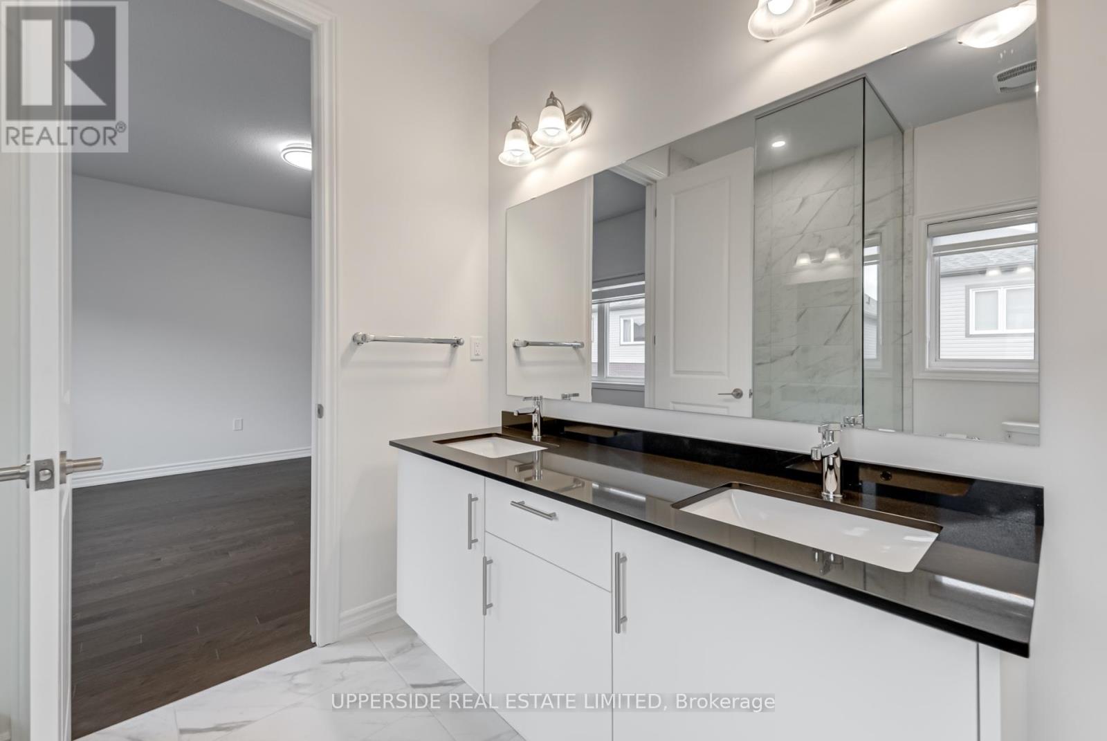 Photo 7 of 73 Gemini Drive, Barrie ON