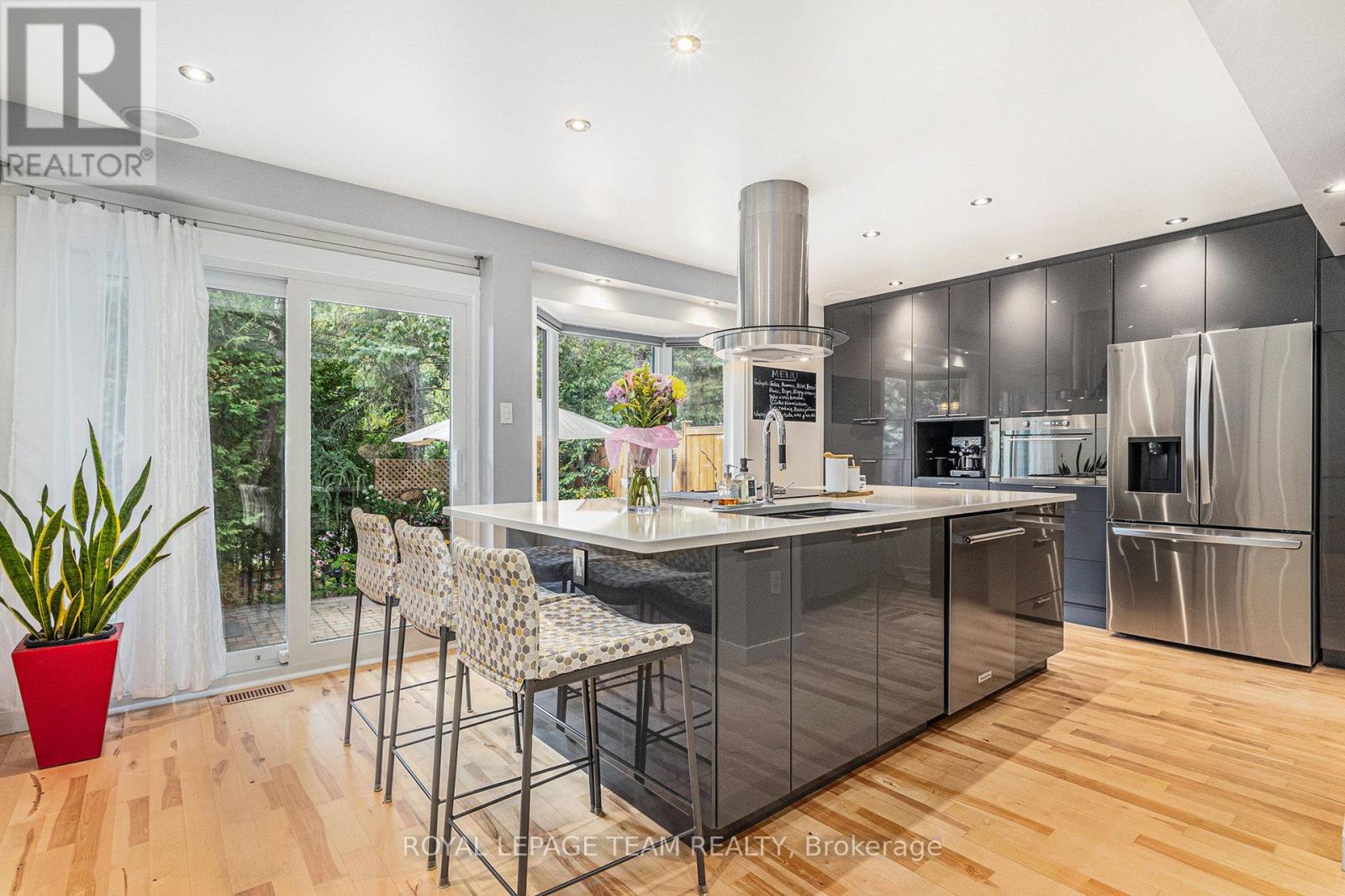 Kitchen modern, open to liv/din with natural light