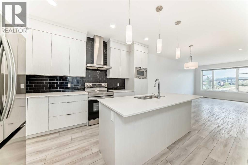 Single Family House for Sale in  Sheriff King Street SW Pine Creek Calgary 