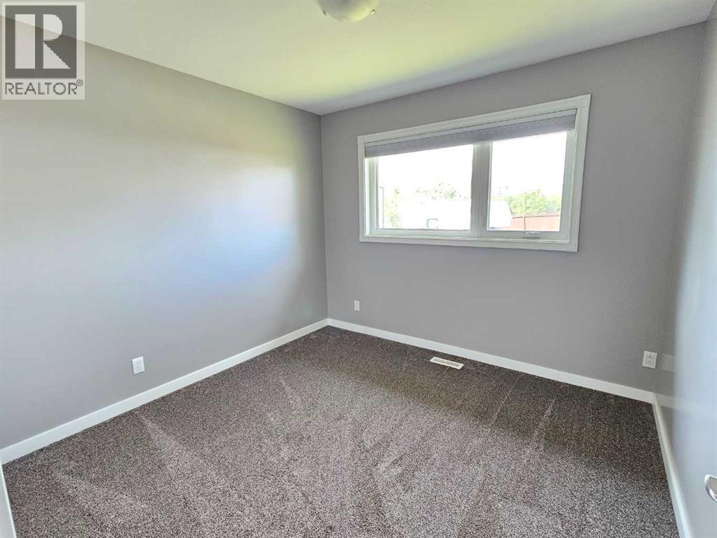 Photo 45 of 9502 100 Street, Bezanson AB