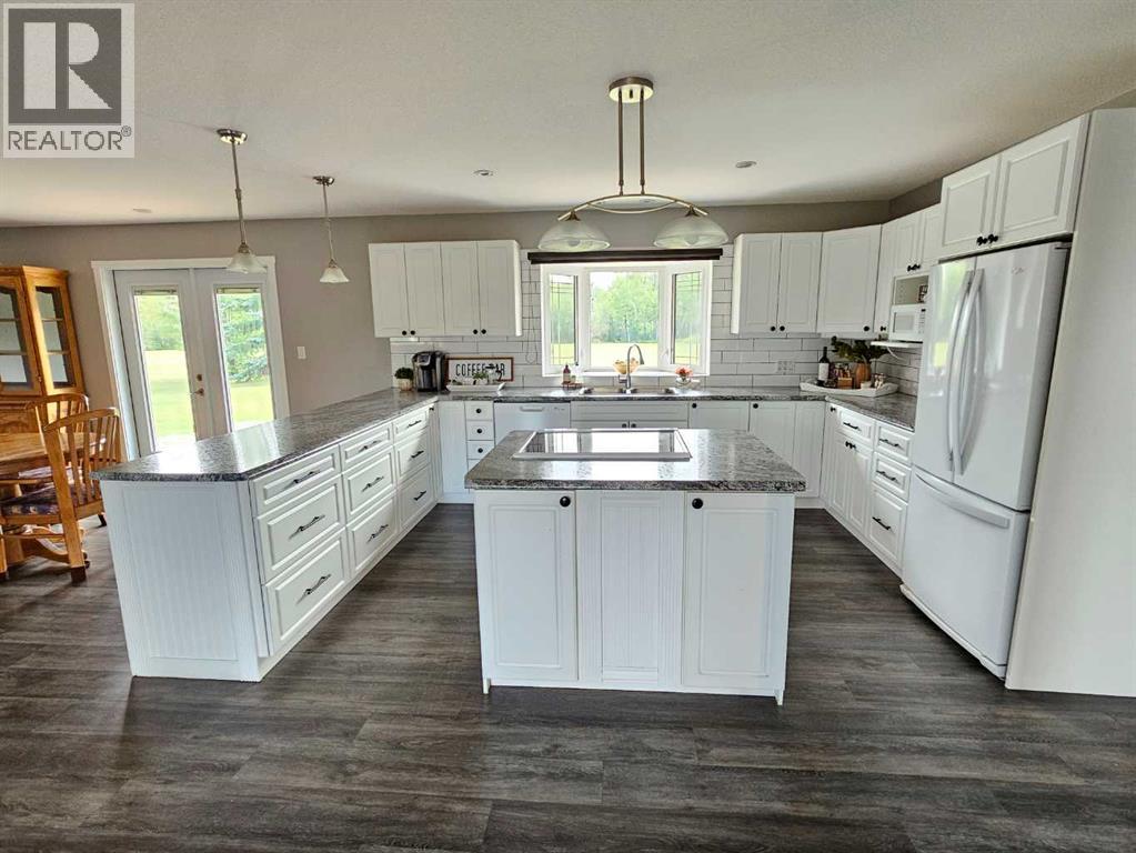 Photo 35 of 9502 100 Street, Bezanson AB