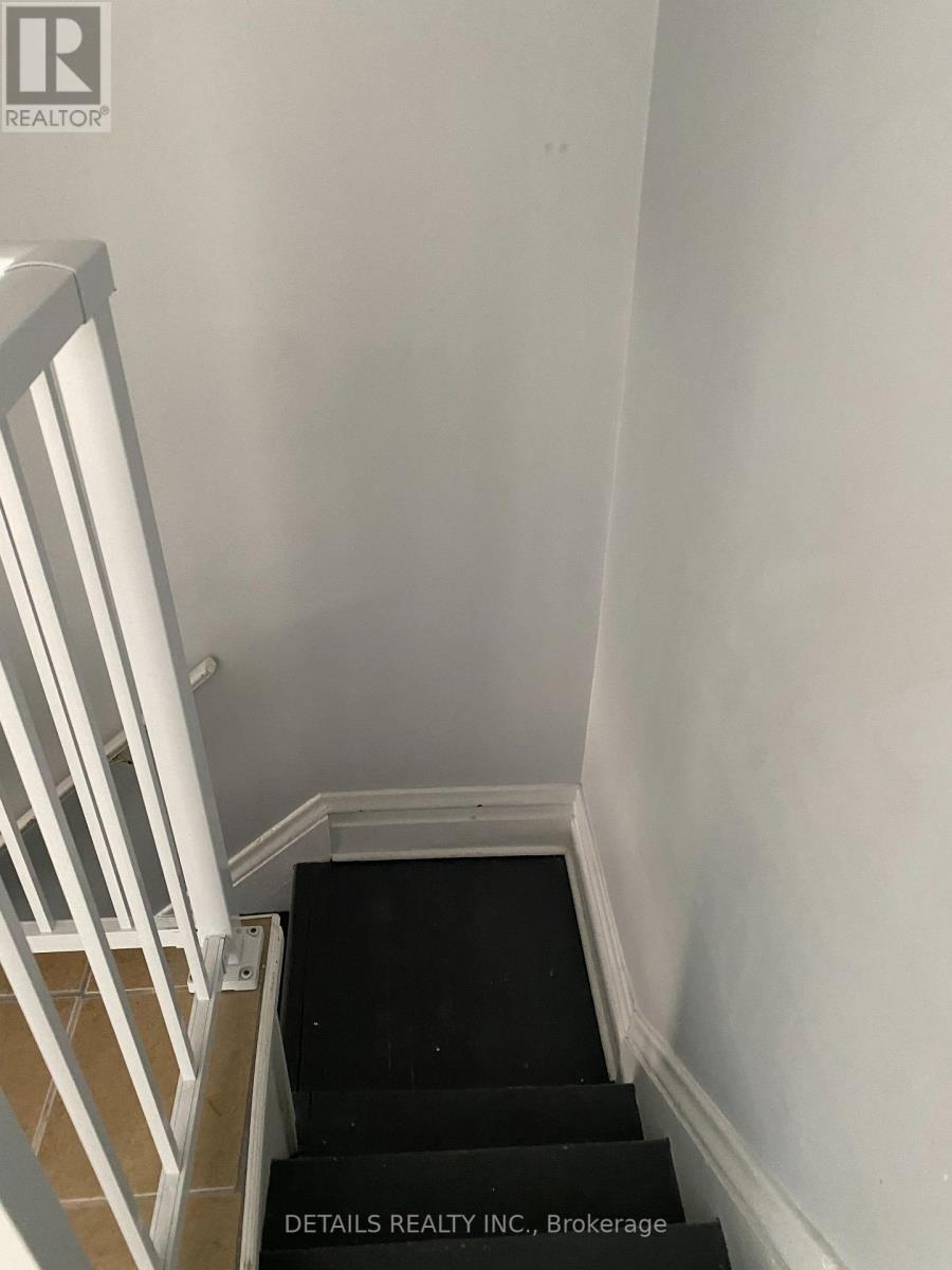 Looking down stairs from upper landing