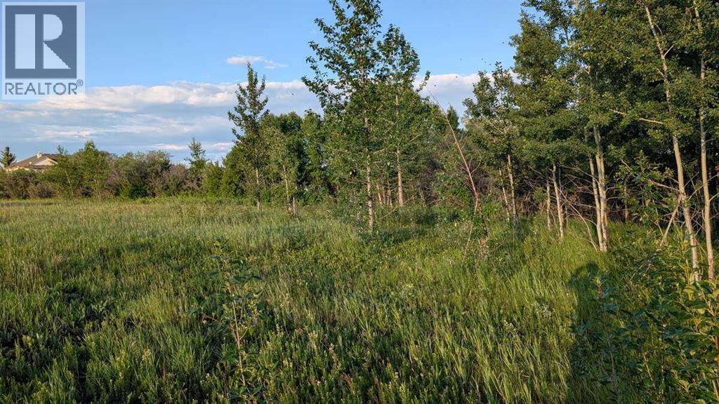 Photo 1 of 19 Lariat Loop, Rural Rocky View County AB