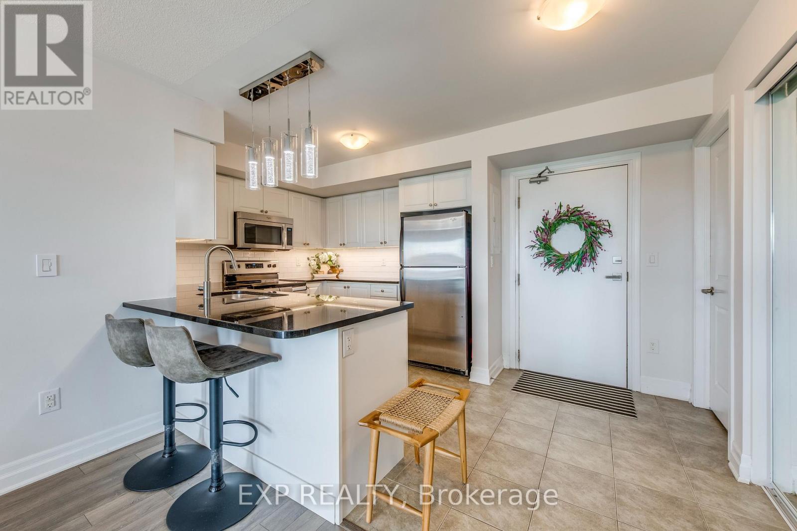 Photo 5 of 406 1005 Nadalin Heights, Milton ON