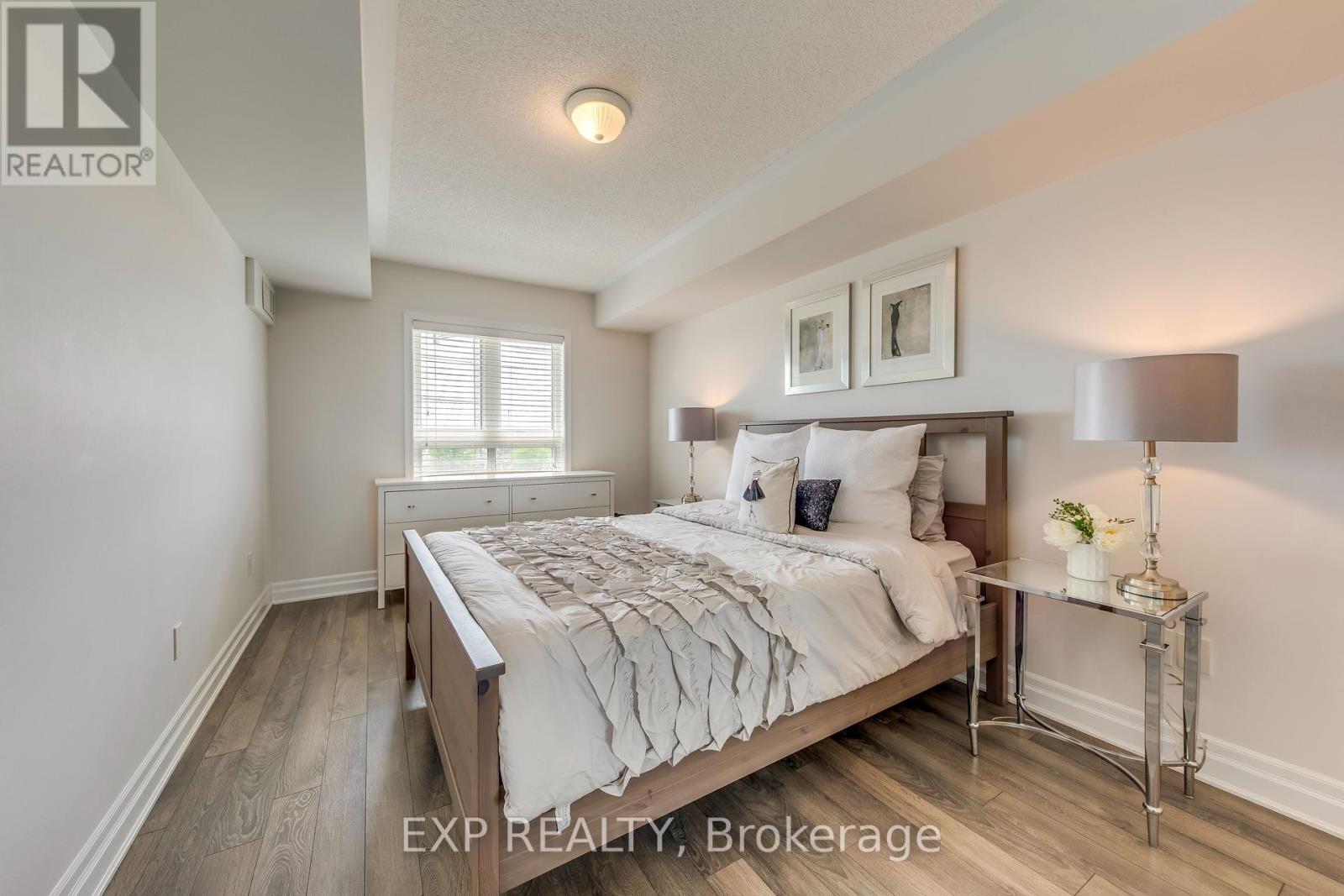 Photo 16 of 406 1005 Nadalin Heights, Milton ON