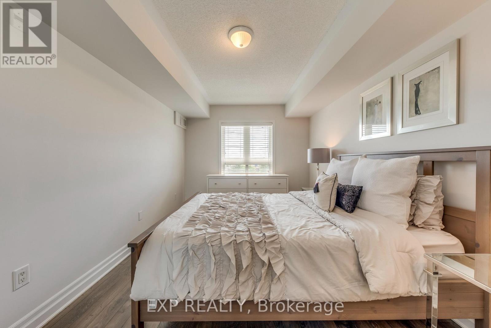 Photo 3 of 406 1005 Nadalin Heights, Milton ON