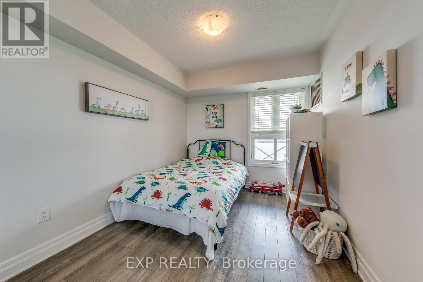Photo 2 of 406 1005 Nadalin Heights, Milton ON