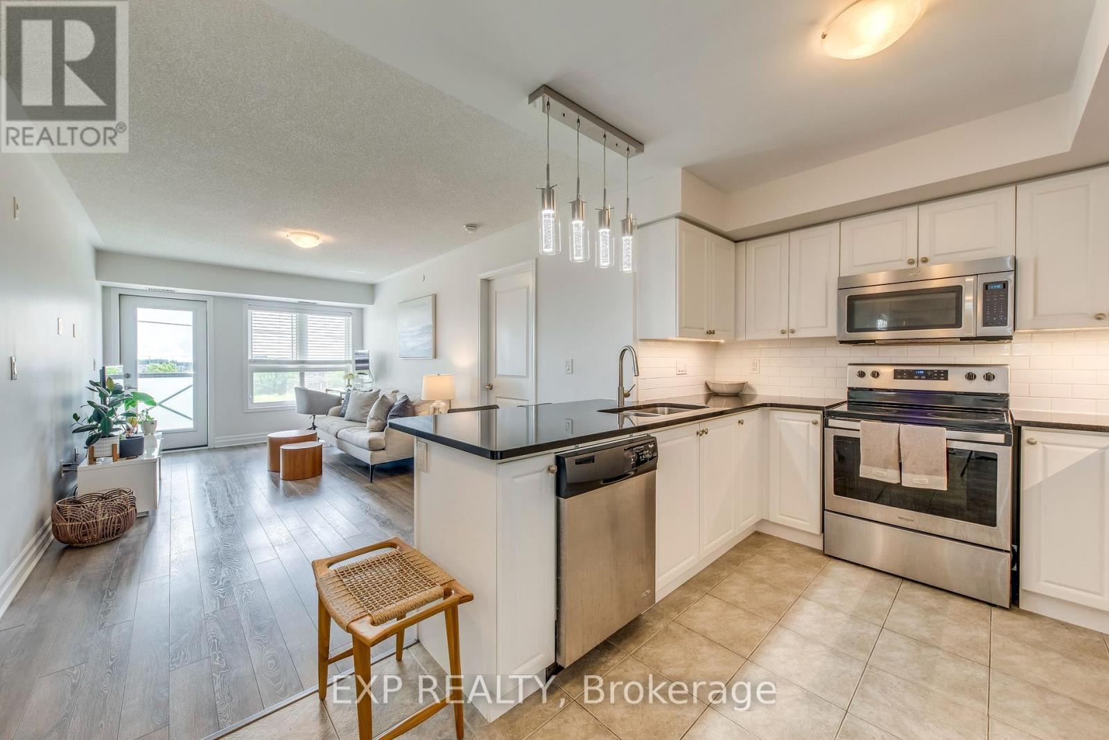 Photo 8 of 406 1005 Nadalin Heights, Milton ON