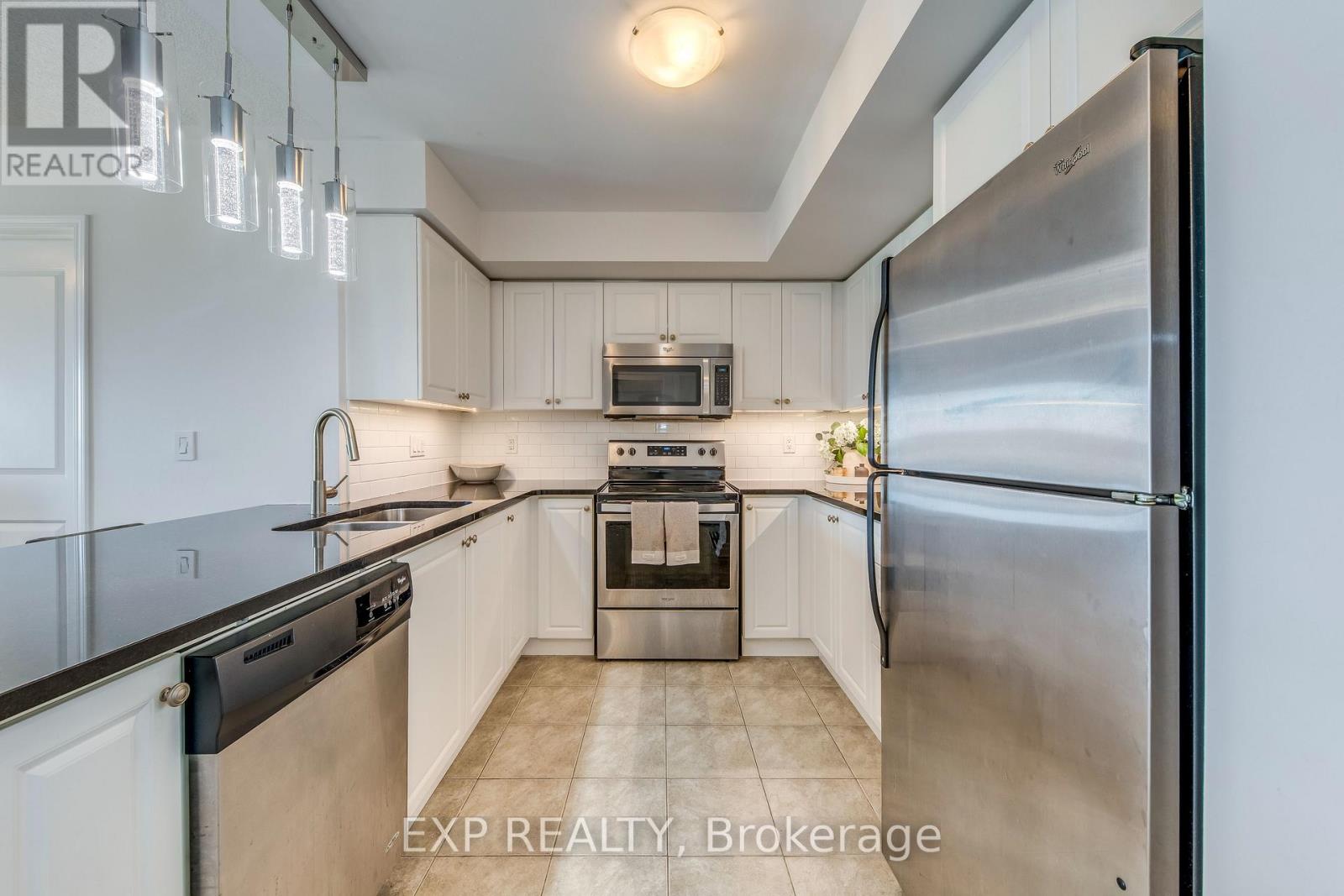 Photo 17 of 406 1005 Nadalin Heights, Milton ON