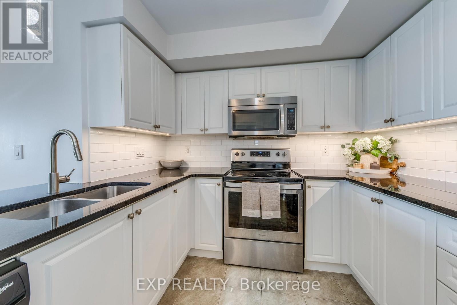 Photo 4 of 406 1005 Nadalin Heights, Milton ON