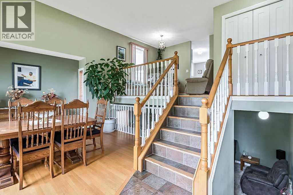 Single Family House 3 Level for Sale in  Shawfield Way SW Shawnessy Calgary 