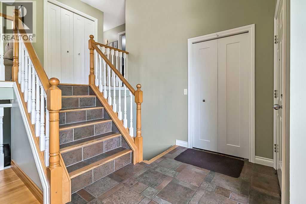 Single Family House 3 Level for Sale in  Shawfield Way SW Shawnessy Calgary 