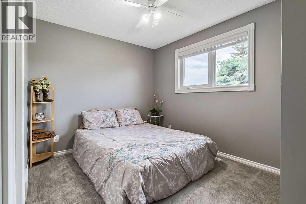 Single Family House 3 Level for Sale in  Shawfield Way SW Shawnessy Calgary 