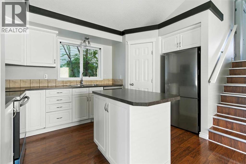 Single Family House 4 Level for Sale in  Evermeadow Road SW Evergreen Calgary 