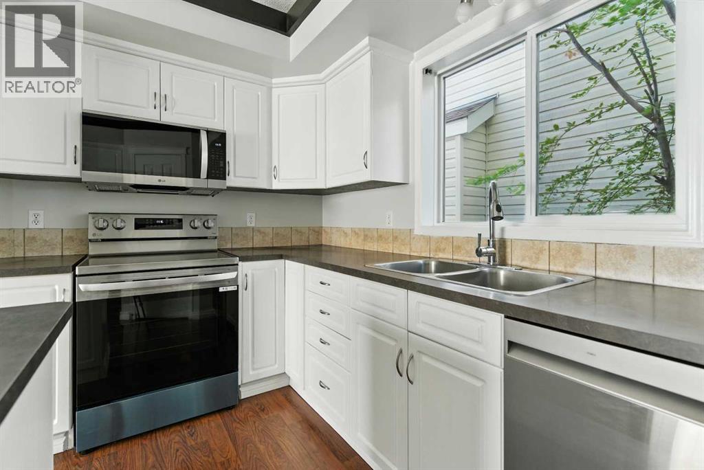 Single Family House 4 Level for Sale in  Evermeadow Road SW Evergreen Calgary 
