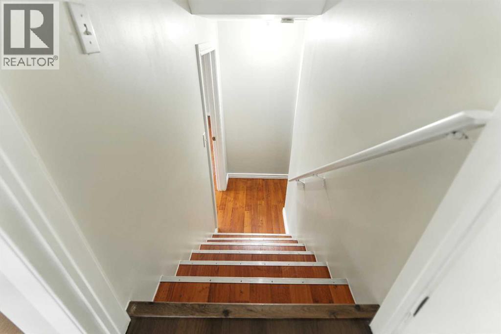 Single Family House 4 Level for Sale in  Evermeadow Road SW Evergreen Calgary 