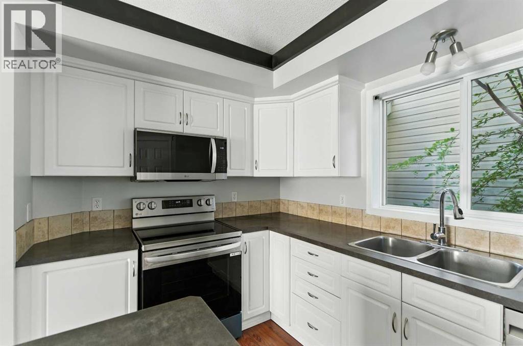 Single Family House 4 Level for Sale in  Evermeadow Road SW Evergreen Calgary 