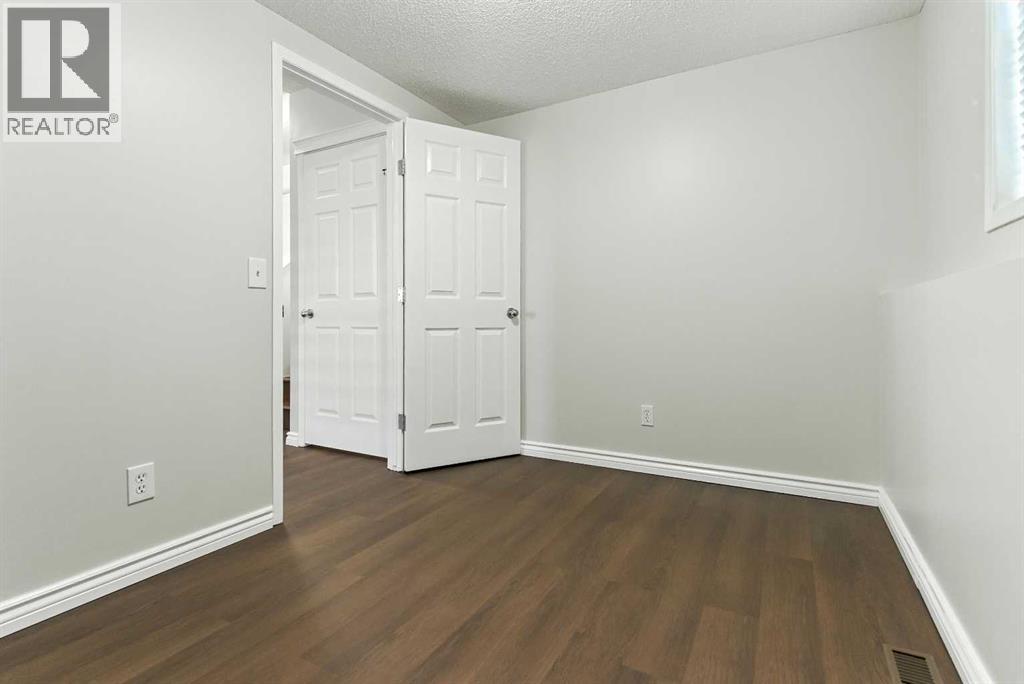 Single Family House 4 Level for Sale in  Evermeadow Road SW Evergreen Calgary 