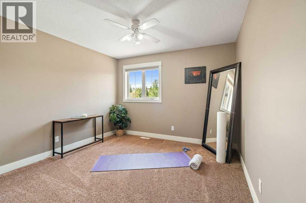 Photo 31 of 52 Bow Ridge Crescent, Cochrane AB
