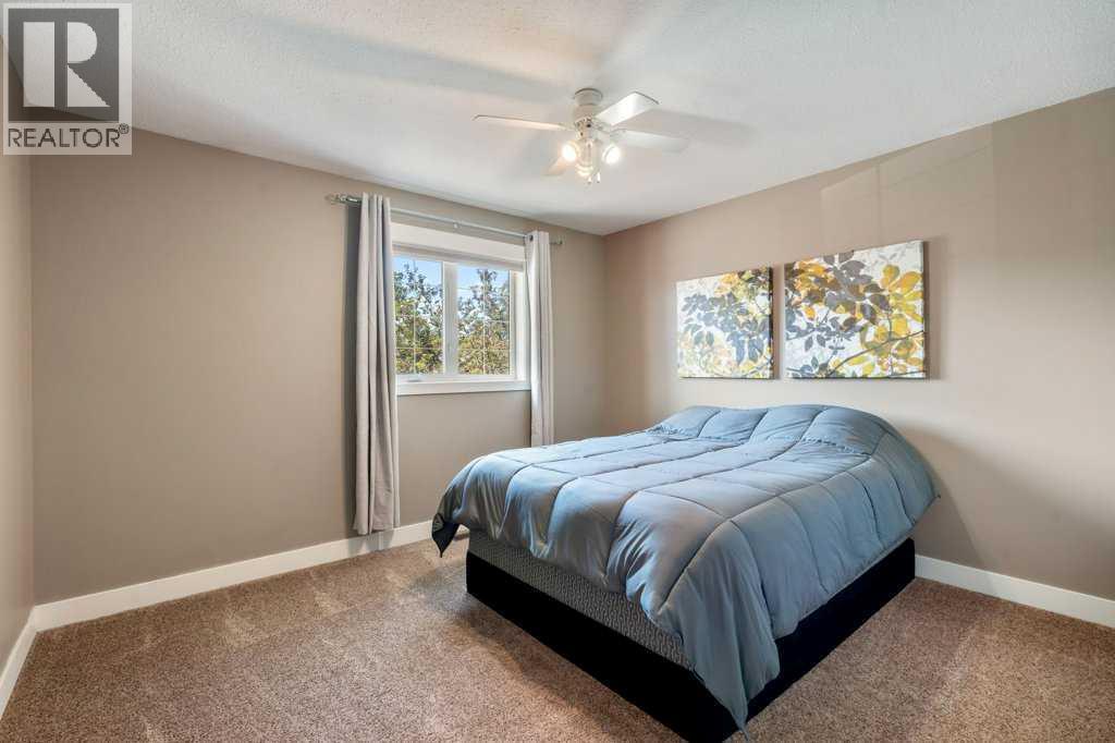 Photo 29 of 52 Bow Ridge Crescent, Cochrane AB