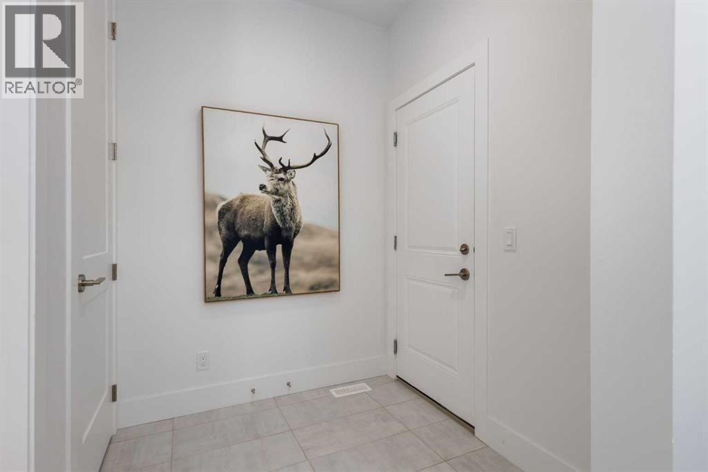 Single Family House Bungalow for Sale in  Treeline Common SW Alpine Park Calgary 