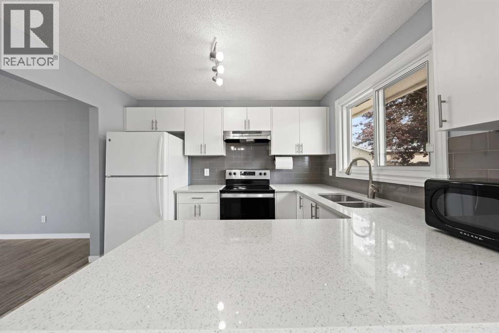 Single Family House Bungalow for Sale in  Penedo Way SE Penbrooke Meadows Calgary 