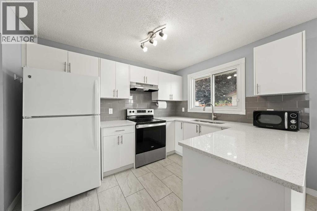 Single Family House Bungalow for Sale in  Penedo Way SE Penbrooke Meadows Calgary 