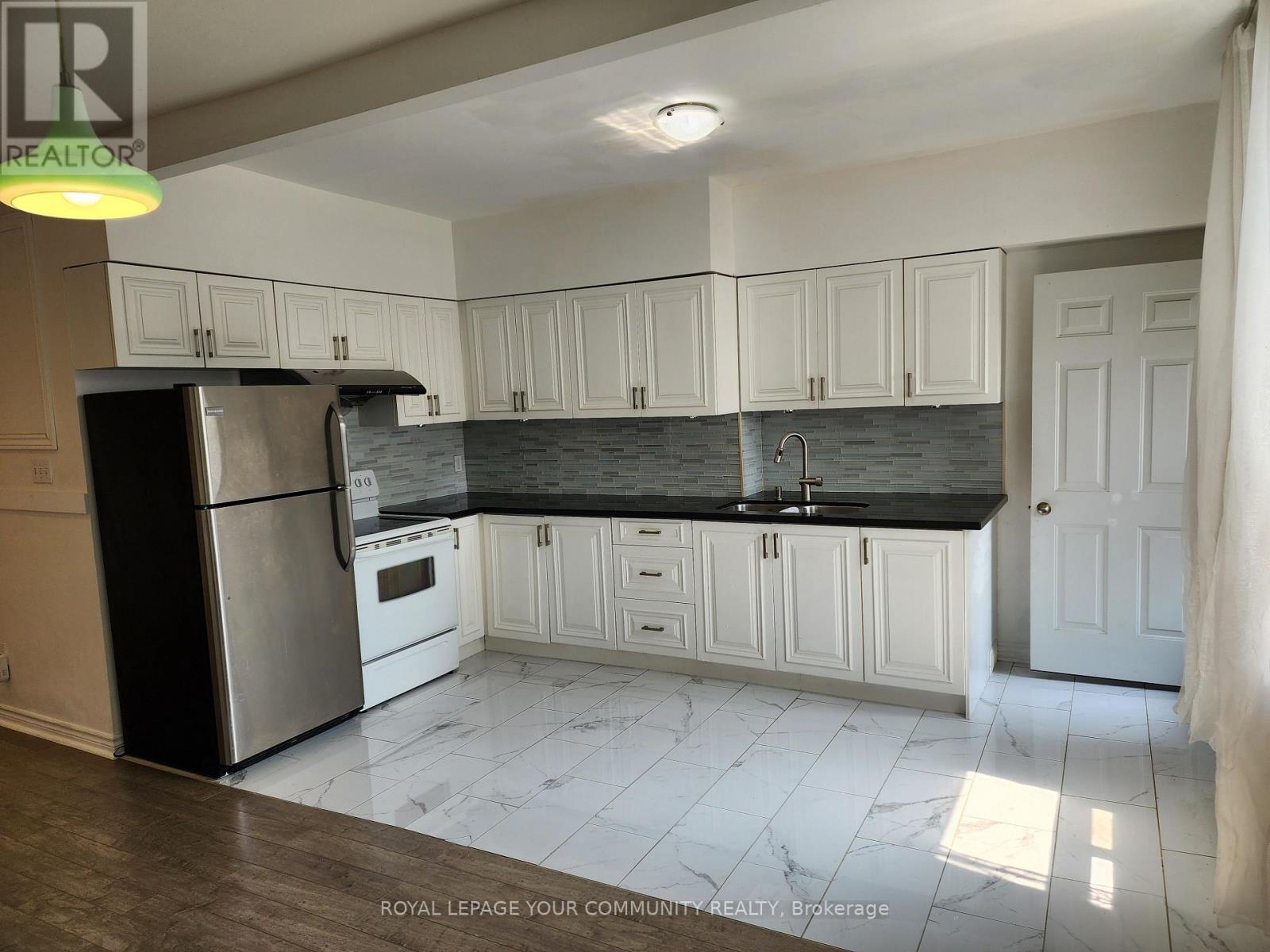 Photo 28 of Upper Floor 1075 Gerrard Street E, Toronto ON